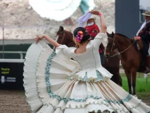 Argentinian traditional festival with gauchos and paisanas