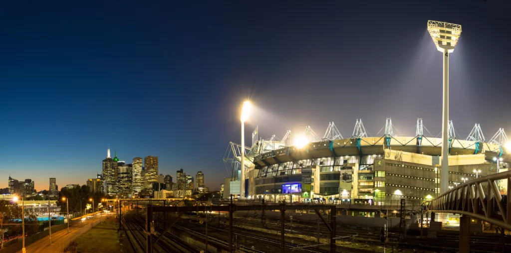 The Melbourne skyline and the Melbourne Cricket Ground at sunse