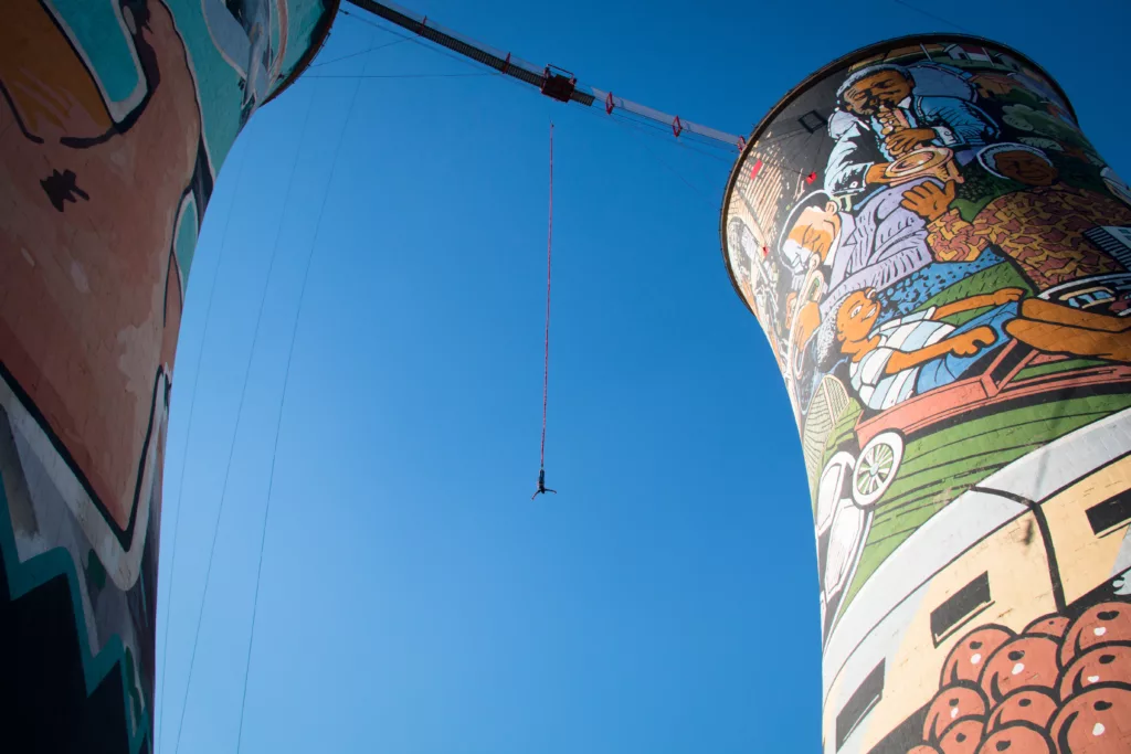 Guy bungee jumping from the Orlando Towers in Soweto, a township of Johannesburg in South Africa.